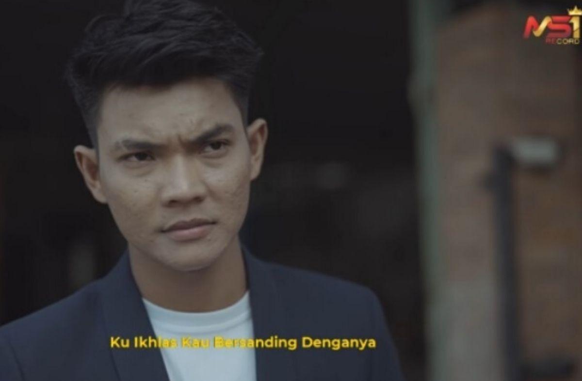 Lirik Lagu “Aku Bukan Jodohnya” Tri Suaka